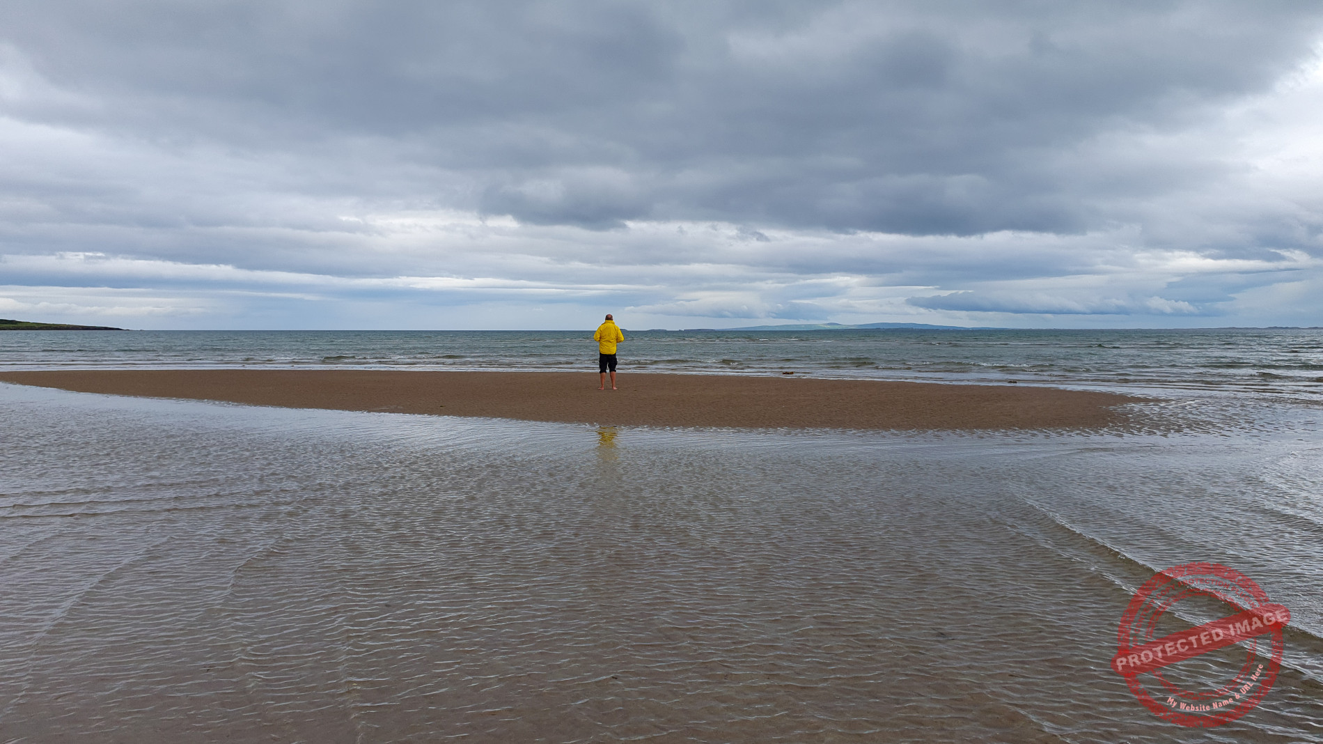 Gerhard, standing on a sandbank, about to be flooded by the rising tide.