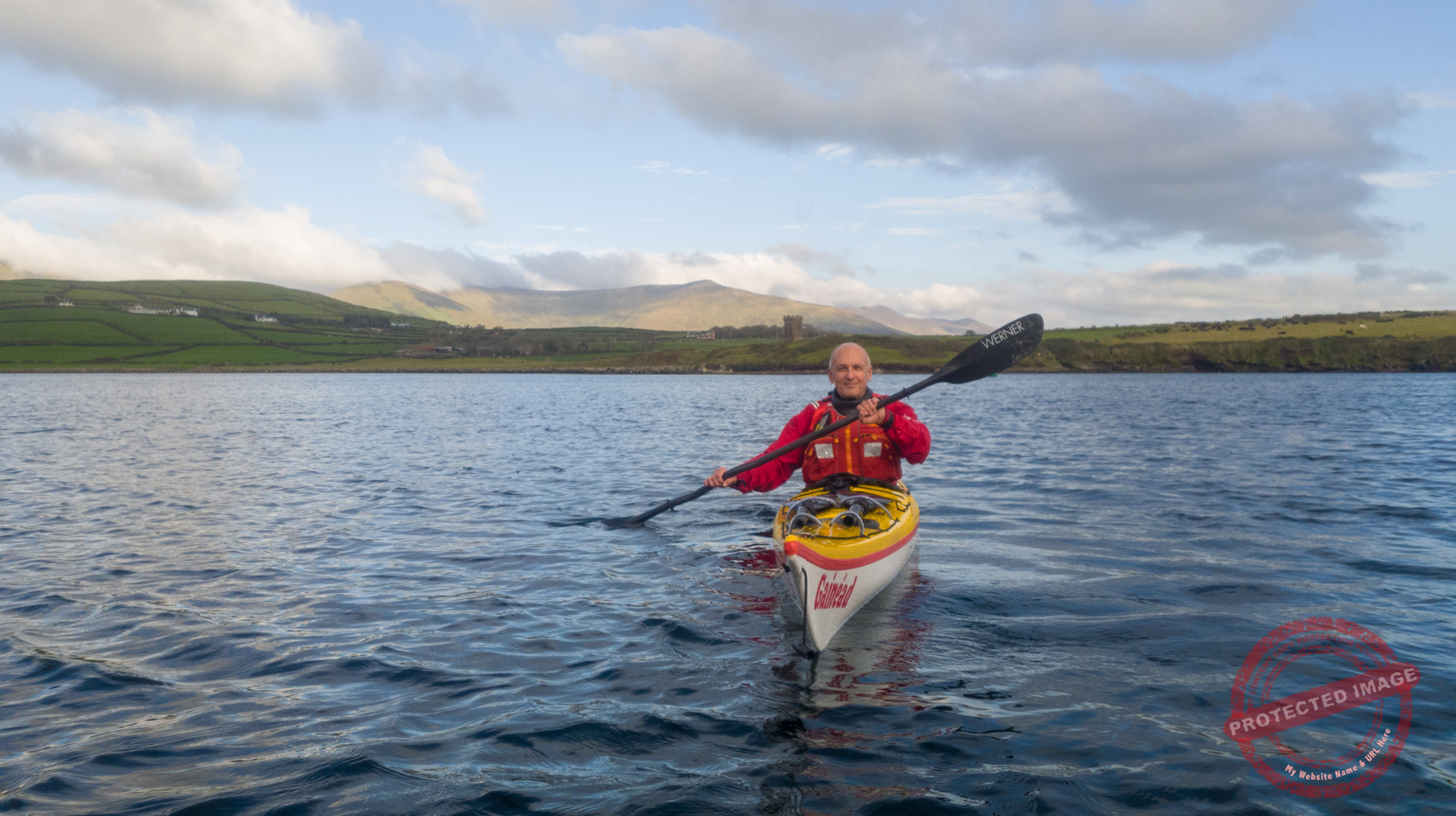 Gerhard in his sea kayak Gainéad in Dingle Harbour.